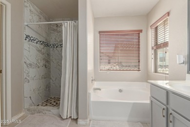 Beautiful and spacious 4-bedroom, 2.5-bath home located in the on Aguila Golf Course - Aguila in Arizona - for sale on GolfHomes.com, golf home, golf lot