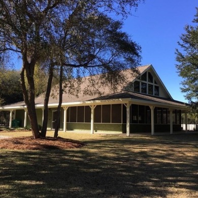 MOTIVATED SELLER! Partially cleared corner lot in the gated on Sapelo Hammock Golf Club in Georgia - for sale on GolfHomes.com, golf home, golf lot