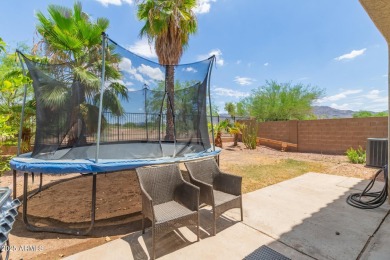 Beautiful and spacious 4-bedroom, 2.5-bath home located in the on Aguila Golf Course - Aguila in Arizona - for sale on GolfHomes.com, golf home, golf lot
