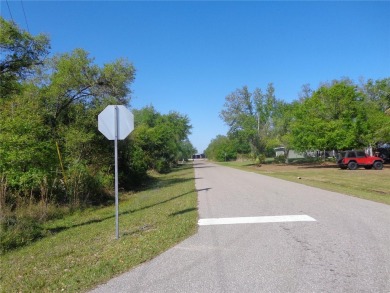Discover Peace River Shores! This corner lot, nestled within a on Live Oak Golf Club and RV Park in Florida - for sale on GolfHomes.com, golf home, golf lot