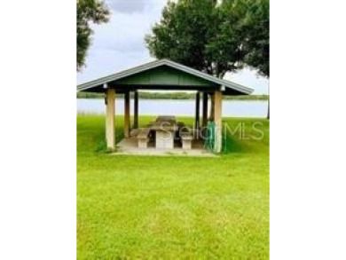 Discover Peace River Shores! This corner lot, nestled within a on Live Oak Golf Club and RV Park in Florida - for sale on GolfHomes.com, golf home, golf lot