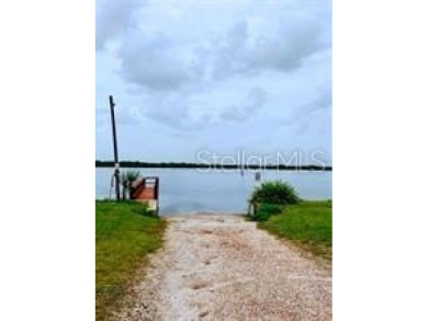 Discover Peace River Shores! This corner lot, nestled within a on Live Oak Golf Club and RV Park in Florida - for sale on GolfHomes.com, golf home, golf lot
