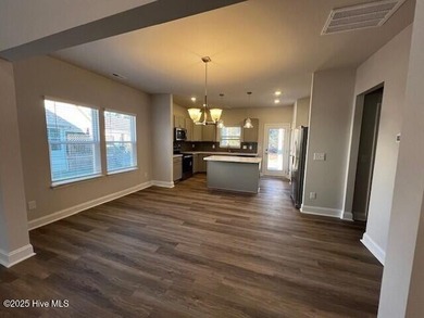 The Kent, built by Dream Finders Homes, is a stunning on Harbour Point Golf Club in North Carolina - for sale on GolfHomes.com, golf home, golf lot