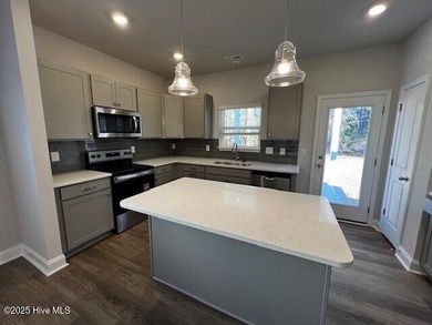 The Kent, built by Dream Finders Homes, is a stunning on Harbour Point Golf Club in North Carolina - for sale on GolfHomes.com, golf home, golf lot