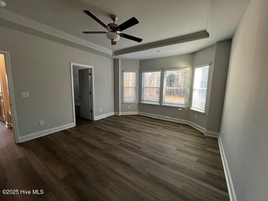 The Kent, built by Dream Finders Homes, is a stunning on Harbour Point Golf Club in North Carolina - for sale on GolfHomes.com, golf home, golf lot