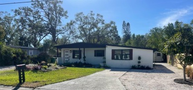 Charming and newly renovated 4-Bedroom, 3 Bathroom Home with on Rogers Park Golf Course in Florida - for sale on GolfHomes.com, golf home, golf lot