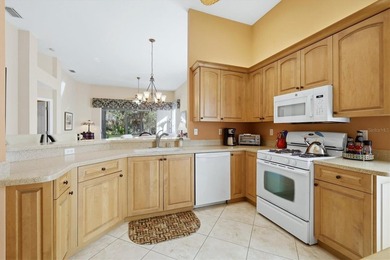 This move-in ready 2-bedroom, 2-bath Hibiscus model villa--with on University Park Country Club in Florida - for sale on GolfHomes.com, golf home, golf lot