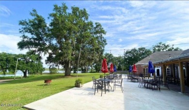 Canal front Coastal Home. Remodeled in 2023. 2 story modern on Mississippi National Golf Course in Mississippi - for sale on GolfHomes.com, golf home, golf lot