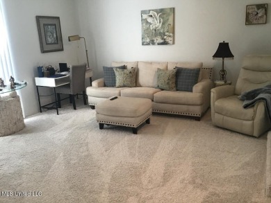 Canal front Coastal Home. Remodeled in 2023. 2 story modern on Mississippi National Golf Course in Mississippi - for sale on GolfHomes.com, golf home, golf lot