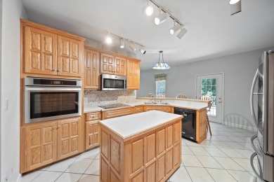 Need room for that car collection? This stunning custom-built on Santee National Golf Course in South Carolina - for sale on GolfHomes.com, golf home, golf lot