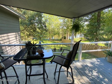 Canal front Coastal Home. Remodeled in 2023. 2 story modern on Mississippi National Golf Course in Mississippi - for sale on GolfHomes.com, golf home, golf lot