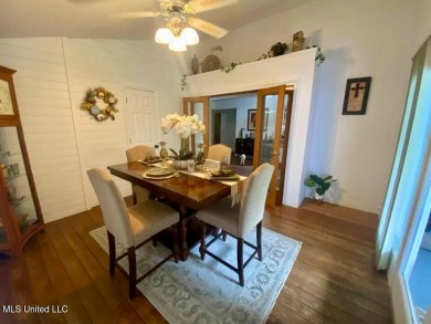 Canal front Coastal Home. Remodeled in 2023. 2 story modern on Mississippi National Golf Course in Mississippi - for sale on GolfHomes.com, golf home, golf lot