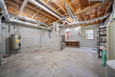 Need room for that car collection? This stunning custom-built on Santee National Golf Course in South Carolina - for sale on GolfHomes.com, golf home, golf lot