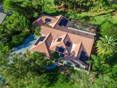 Beautifully nestled in the desirable Country Club Estates on St. Lucie Trail Golf Club in Florida - for sale on GolfHomes.com, golf home, golf lot