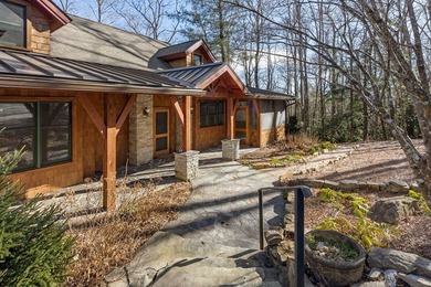 Nestled within prestigious Cullasaja Club, this inviting on Cullasaja Club in North Carolina - for sale on GolfHomes.com, golf home, golf lot