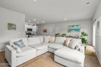 Welcome to this impeccably maintained 3-bedroom, 2-bathroom home on Ocean Ridge Plantation in North Carolina - for sale on GolfHomes.com, golf home, golf lot