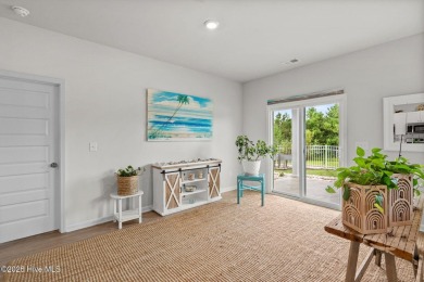 Welcome to this impeccably maintained 3-bedroom, 2-bathroom home on Ocean Ridge Plantation in North Carolina - for sale on GolfHomes.com, golf home, golf lot