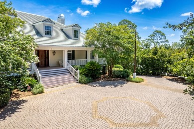 Timeless elegance on the bay behind the gates of prestigious on Regatta Bay Golf and Country Club in Florida - for sale on GolfHomes.com, golf home, golf lot