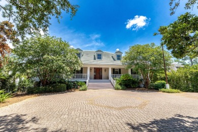 Timeless elegance on the bay behind the gates of prestigious on Regatta Bay Golf and Country Club in Florida - for sale on GolfHomes.com, golf home, golf lot