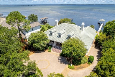 Timeless elegance on the bay behind the gates of prestigious on Regatta Bay Golf and Country Club in Florida - for sale on GolfHomes.com, golf home, golf lot