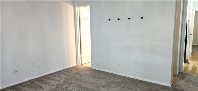 Come see this light, bright & airy renovated 2 bedroom-2 bath on The American Golf Club in Florida - for sale on GolfHomes.com, golf home, golf lot