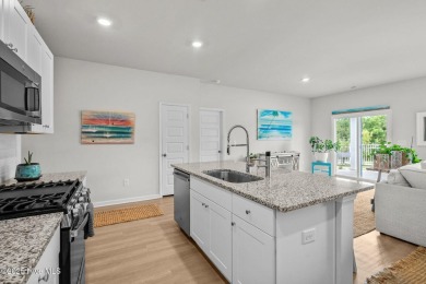 Welcome to this impeccably maintained 3-bedroom, 2-bathroom home on Ocean Ridge Plantation in North Carolina - for sale on GolfHomes.com, golf home, golf lot