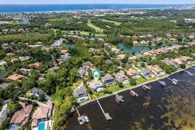 Timeless elegance on the bay behind the gates of prestigious on Regatta Bay Golf and Country Club in Florida - for sale on GolfHomes.com, golf home, golf lot