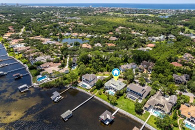 Timeless elegance on the bay behind the gates of prestigious on Regatta Bay Golf and Country Club in Florida - for sale on GolfHomes.com, golf home, golf lot