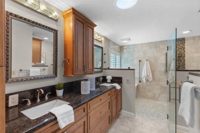 Welcome to your dream home in the exclusive gated community of on East Lake Woodlands Country Club in Florida - for sale on GolfHomes.com, golf home, golf lot