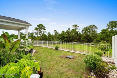Welcome to this impeccably maintained 3-bedroom, 2-bathroom home on Ocean Ridge Plantation in North Carolina - for sale on GolfHomes.com, golf home, golf lot