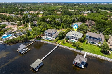 Timeless elegance on the bay behind the gates of prestigious on Regatta Bay Golf and Country Club in Florida - for sale on GolfHomes.com, golf home, golf lot