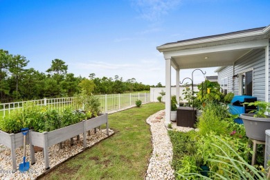 Welcome to this impeccably maintained 3-bedroom, 2-bathroom home on Ocean Ridge Plantation in North Carolina - for sale on GolfHomes.com, golf home, golf lot