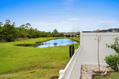 Welcome to this impeccably maintained 3-bedroom, 2-bathroom home on Ocean Ridge Plantation in North Carolina - for sale on GolfHomes.com, golf home, golf lot