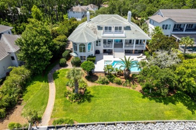 Timeless elegance on the bay behind the gates of prestigious on Regatta Bay Golf and Country Club in Florida - for sale on GolfHomes.com, golf home, golf lot