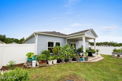 Welcome to this impeccably maintained 3-bedroom, 2-bathroom home on Ocean Ridge Plantation in North Carolina - for sale on GolfHomes.com, golf home, golf lot
