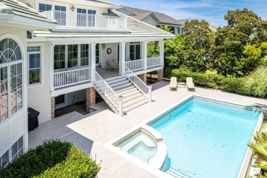 Timeless elegance on the bay behind the gates of prestigious on Regatta Bay Golf and Country Club in Florida - for sale on GolfHomes.com, golf home, golf lot