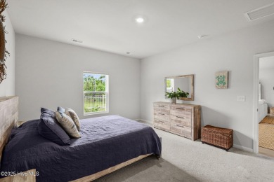 Welcome to this impeccably maintained 3-bedroom, 2-bathroom home on Ocean Ridge Plantation in North Carolina - for sale on GolfHomes.com, golf home, golf lot