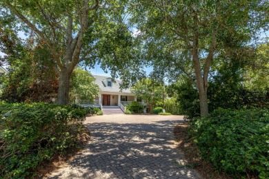 Timeless elegance on the bay behind the gates of prestigious on Regatta Bay Golf and Country Club in Florida - for sale on GolfHomes.com, golf home, golf lot