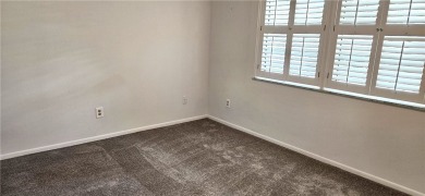 Come see this light, bright & airy renovated 2 bedroom-2 bath on The American Golf Club in Florida - for sale on GolfHomes.com, golf home, golf lot