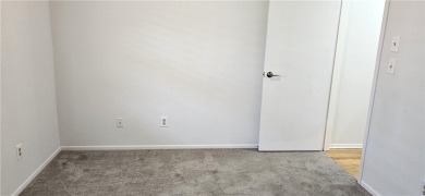 Come see this light, bright & airy renovated 2 bedroom-2 bath on The American Golf Club in Florida - for sale on GolfHomes.com, golf home, golf lot