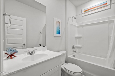 Welcome to this impeccably maintained 3-bedroom, 2-bathroom home on Ocean Ridge Plantation in North Carolina - for sale on GolfHomes.com, golf home, golf lot