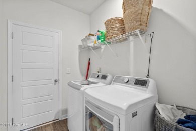 Welcome to this impeccably maintained 3-bedroom, 2-bathroom home on Ocean Ridge Plantation in North Carolina - for sale on GolfHomes.com, golf home, golf lot