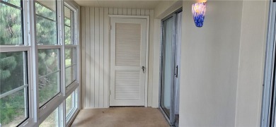 Come see this light, bright & airy renovated 2 bedroom-2 bath on The American Golf Club in Florida - for sale on GolfHomes.com, golf home, golf lot