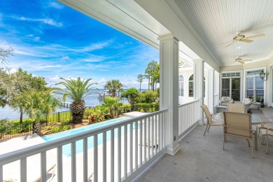 Timeless elegance on the bay behind the gates of prestigious on Regatta Bay Golf and Country Club in Florida - for sale on GolfHomes.com, golf home, golf lot