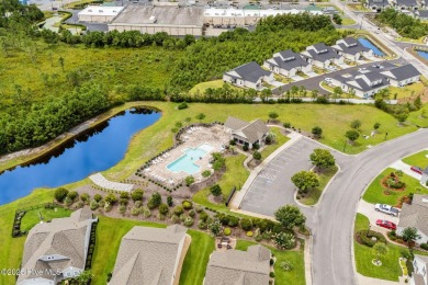 Welcome to this impeccably maintained 3-bedroom, 2-bathroom home on Ocean Ridge Plantation in North Carolina - for sale on GolfHomes.com, golf home, golf lot