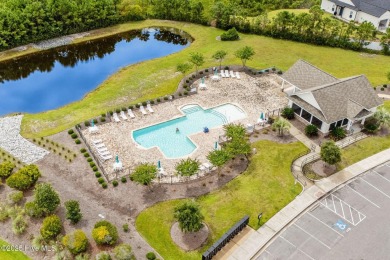 Welcome to this impeccably maintained 3-bedroom, 2-bathroom home on Ocean Ridge Plantation in North Carolina - for sale on GolfHomes.com, golf home, golf lot
