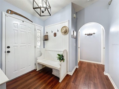 Welcome to this well-maintained 3-bedroom, 2-bath pool home on a on The Grand Club Cypress Course in Florida - for sale on GolfHomes.com, golf home, golf lot