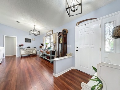 Welcome to this well-maintained 3-bedroom, 2-bath pool home on a on The Grand Club Cypress Course in Florida - for sale on GolfHomes.com, golf home, golf lot