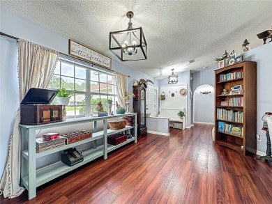 Welcome to this well-maintained 3-bedroom, 2-bath pool home on a on The Grand Club Cypress Course in Florida - for sale on GolfHomes.com, golf home, golf lot