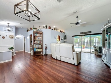 Welcome to this well-maintained 3-bedroom, 2-bath pool home on a on The Grand Club Cypress Course in Florida - for sale on GolfHomes.com, golf home, golf lot